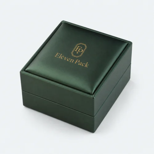Closed dark green PU leather earring box in an angled product view