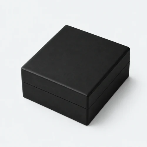 Closed black and white PU leather necklace box in an angled product view